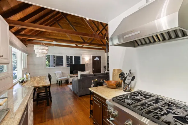 a view of a dining room with furniture window and outside view