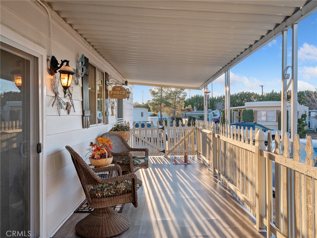 21922 Ottawa Road, Unit 8 Apple Valley, CA 92308 - Photo 25 of 31 a view of balcony with furniture