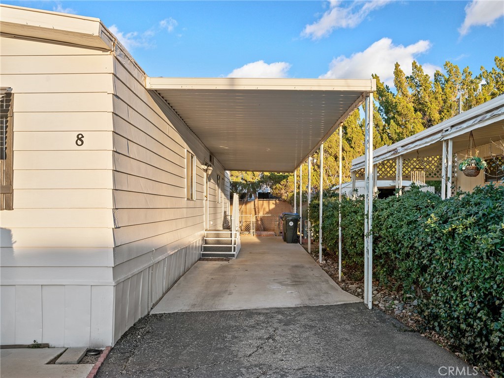 21922 Ottawa Road, Unit 8 Apple Valley, CA 92308 - Photo 29 of 31 a view of a balcony with an outdoor space