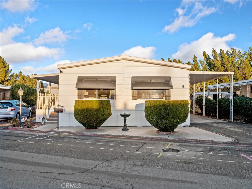21922 Ottawa Road, Unit 8 Apple Valley, CA 92308 - Photo 31 of 31 a view of a white building among the front of a house