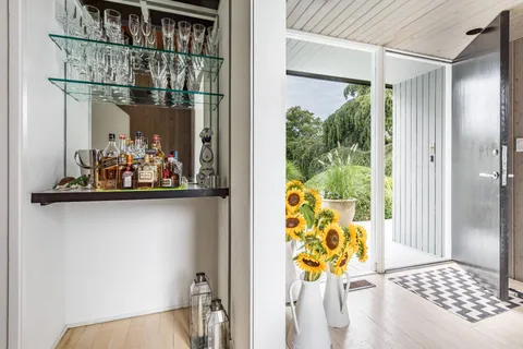 a view of entryway with wooden floor