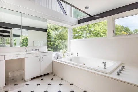 a bathroom with a sink and a bathtub