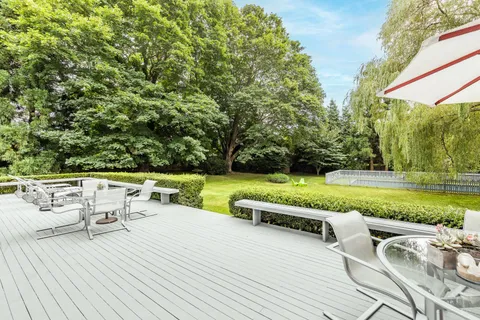 a view of outdoor space yard swimming pool and green space