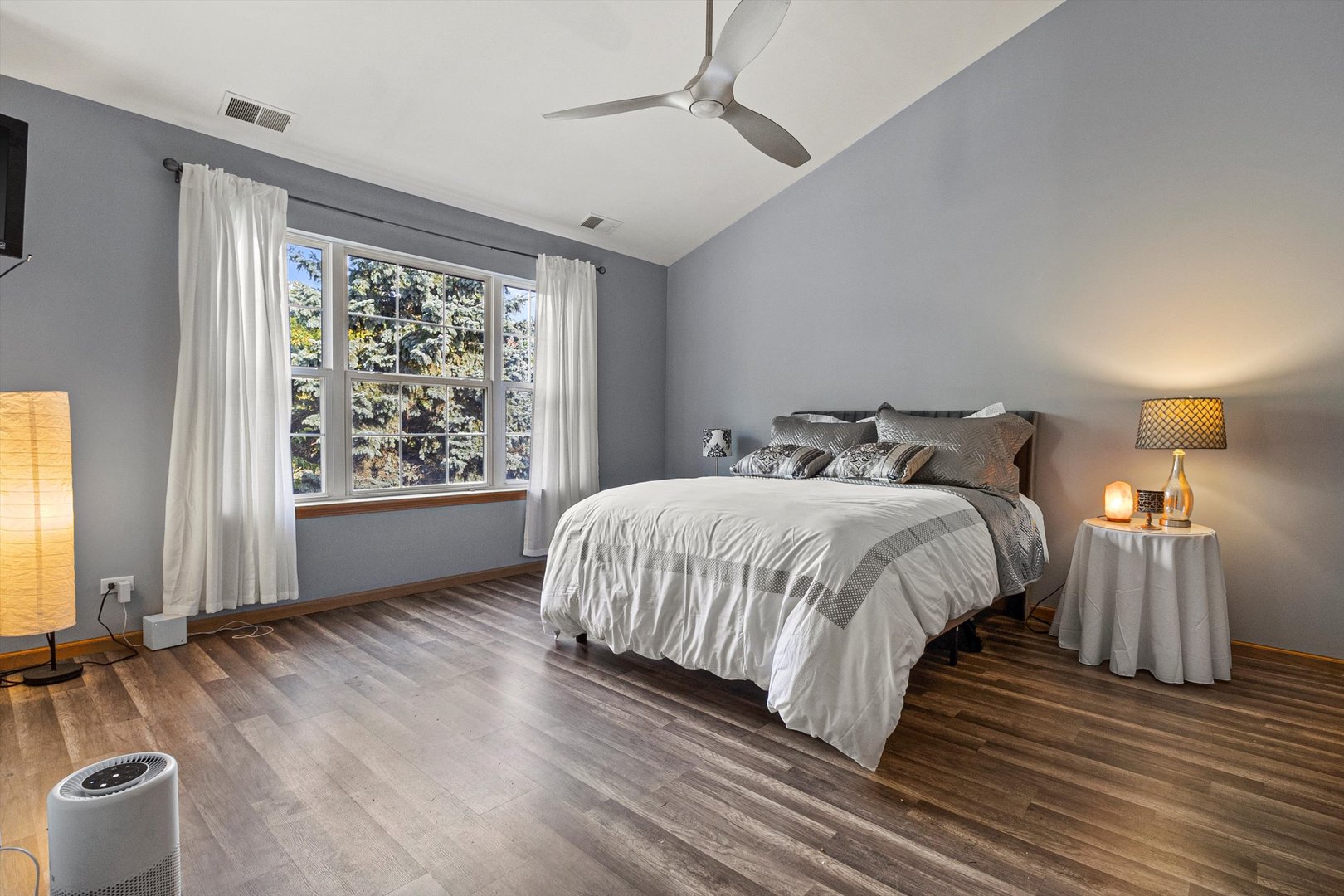 410 Bay Tree Circle Vernon Hills, IL 60061 - Photo 13 of 28 a bedroom with a bed and wooden floor