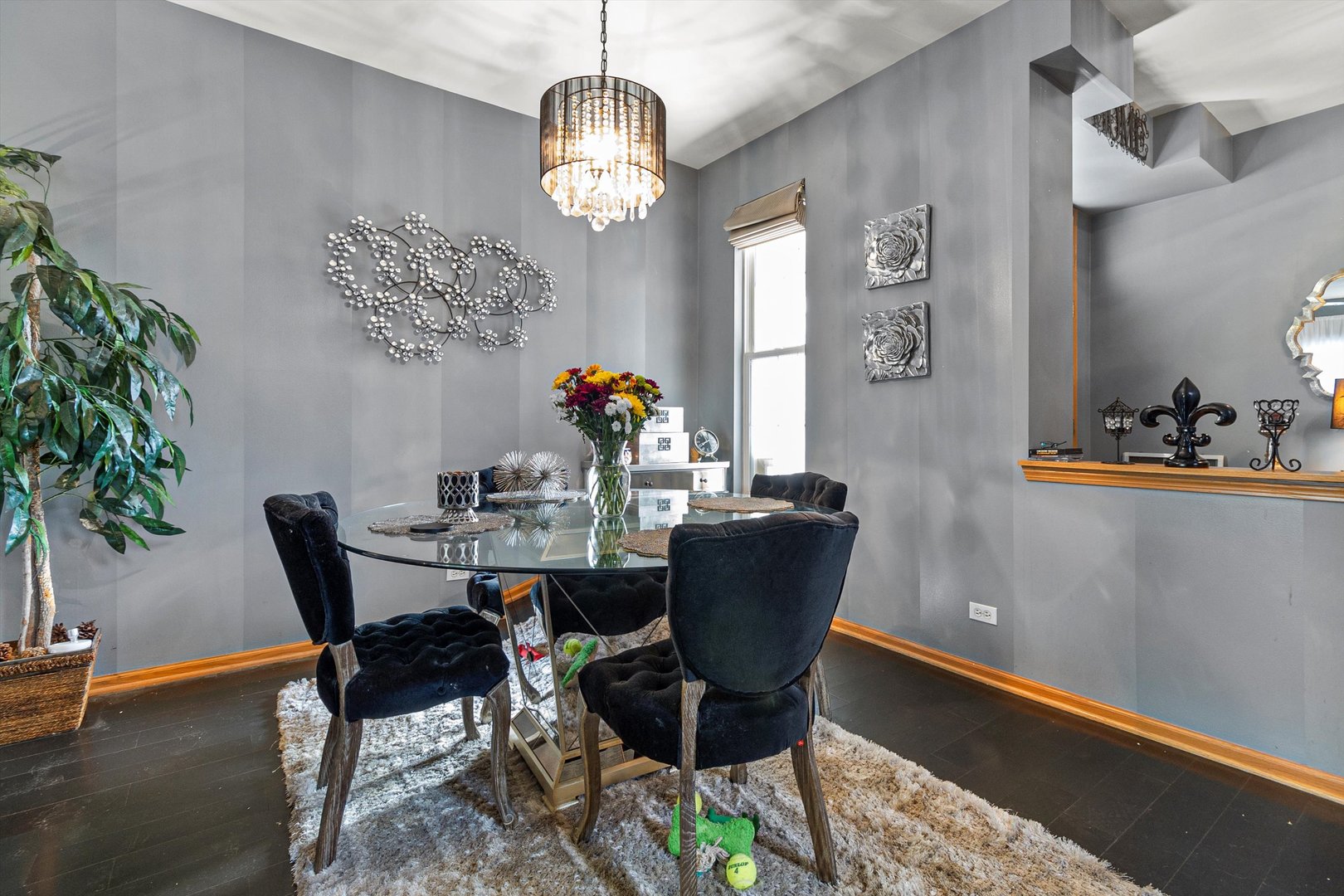 410 Bay Tree Circle Vernon Hills, IL 60061 - Photo 5 of 28 a dining room with furniture potted plants and wooden floor