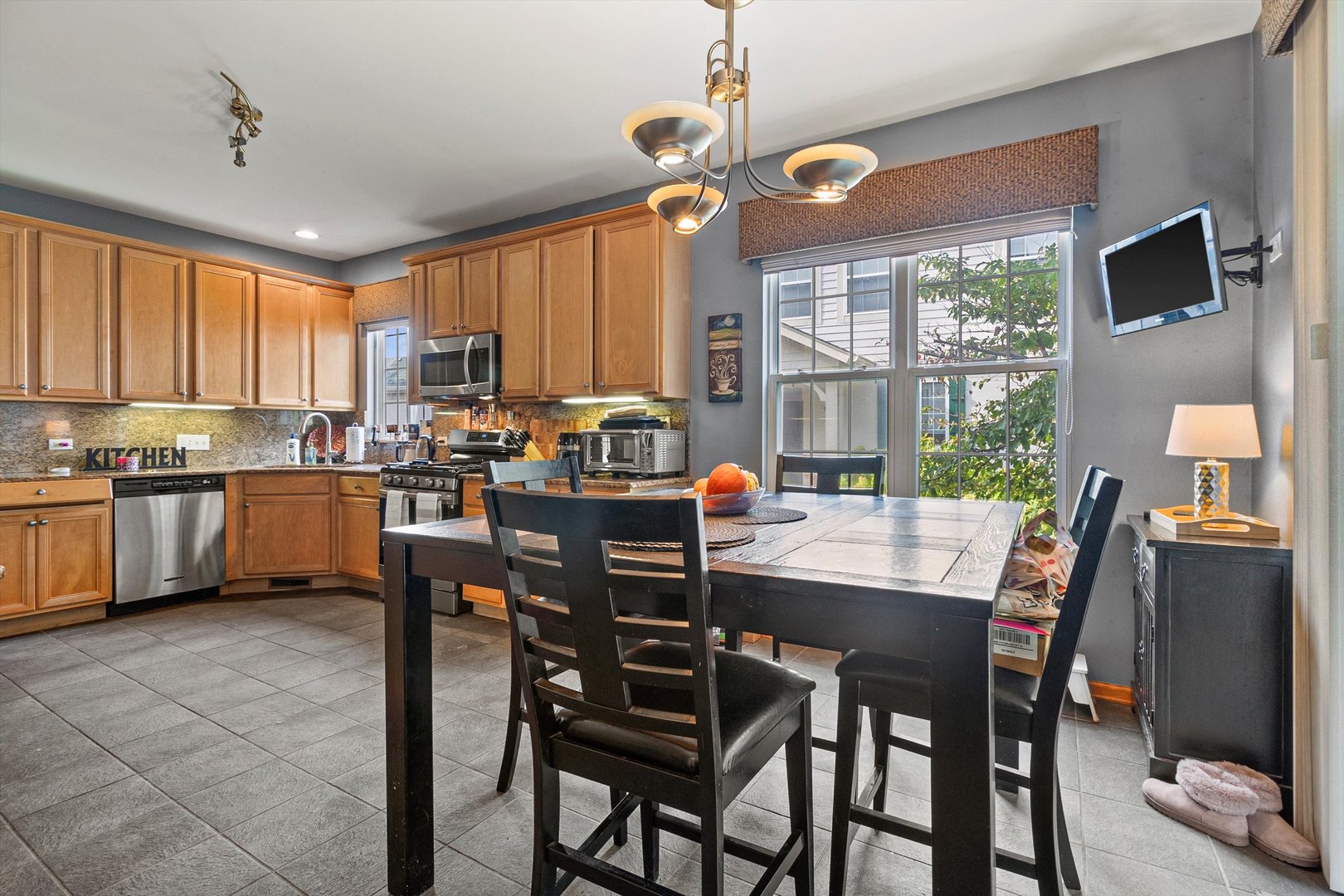 410 Bay Tree Circle Vernon Hills, IL 60061 - Photo 6 of 28 a view of a dining room with furniture window and outside view