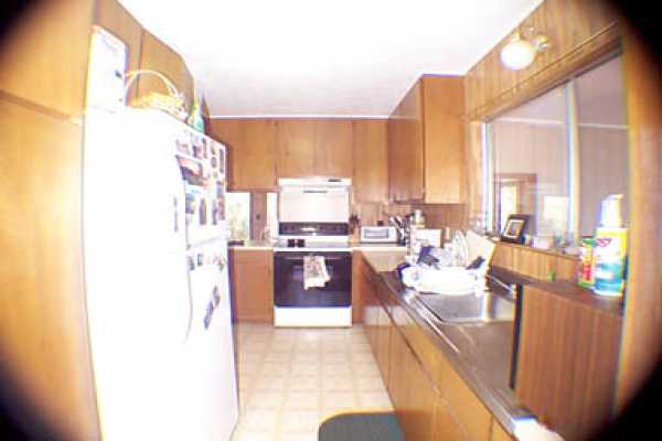 4873 Alii Road Hanapepe, HI 96716 - Photo 11 of 13 a living room with large windows