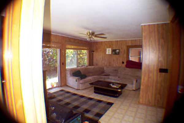 4873 Alii Road Hanapepe, HI 96716 - Photo 12 of 13 a living room with furniture and a window