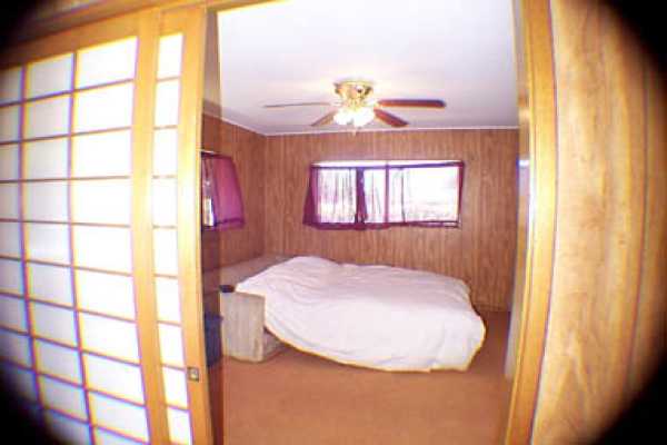 4873 Alii Road Hanapepe, HI 96716 - Photo 13 of 13 a bathroom with a sink and a mirror
