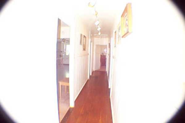 4873 Alii Road Hanapepe, HI 96716 - Photo 3 of 13 a view of a bathroom with a shower curtain