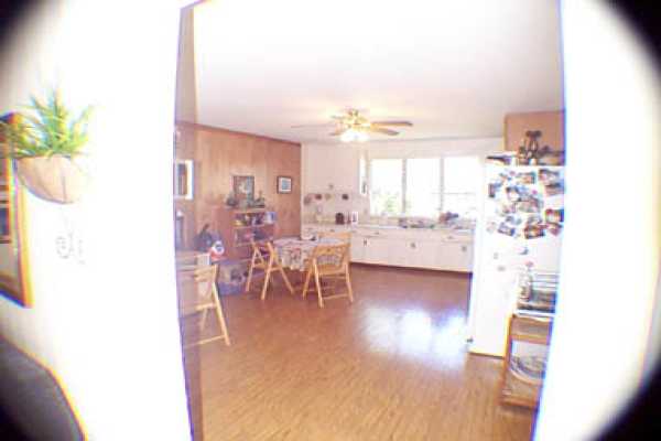 4873 Alii Road Hanapepe, HI 96716 - Photo 4 of 13 a living room with furniture and a wooden floor