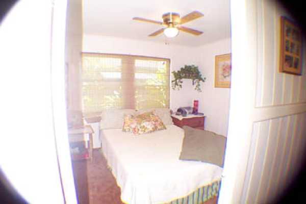 4873 Alii Road Hanapepe, HI 96716 - Photo 6 of 13 a living room with furniture and a large window