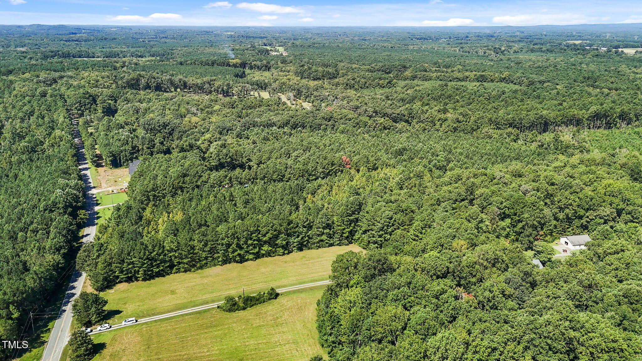 476 Pete Thomas Road Pittsboro, NC 27312 - Photo 6 of 16 an aerial view of a house with a yard