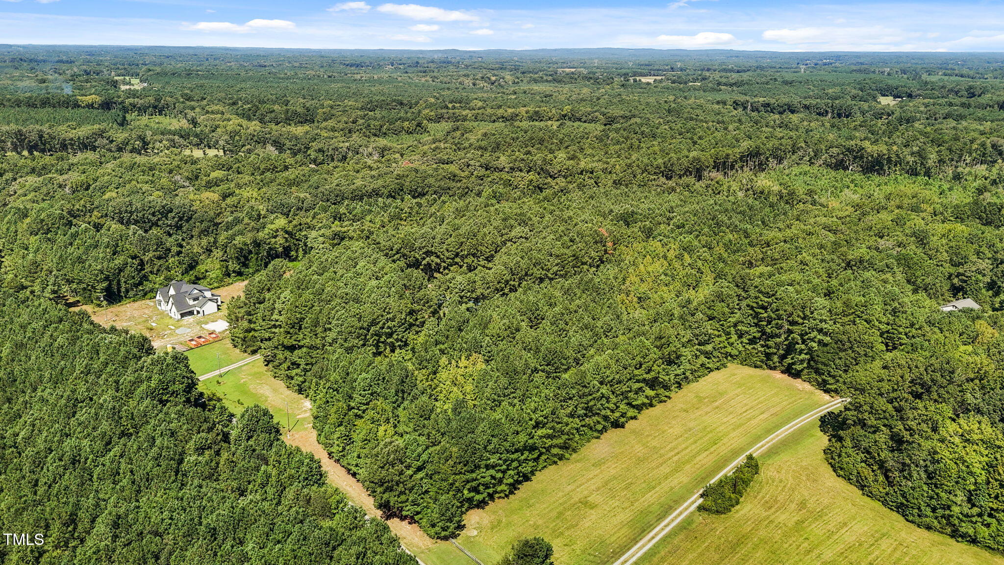 476 Pete Thomas Road Pittsboro, NC 27312 - Photo 9 of 16 a view of a city