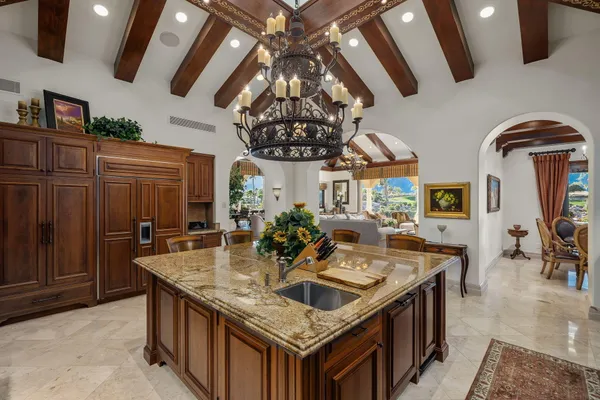 a bed room with a bed couch and a window