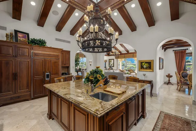 a bed room with a bed couch and a window