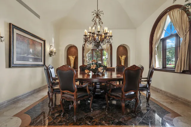 a bedroom with a bed and a balcony