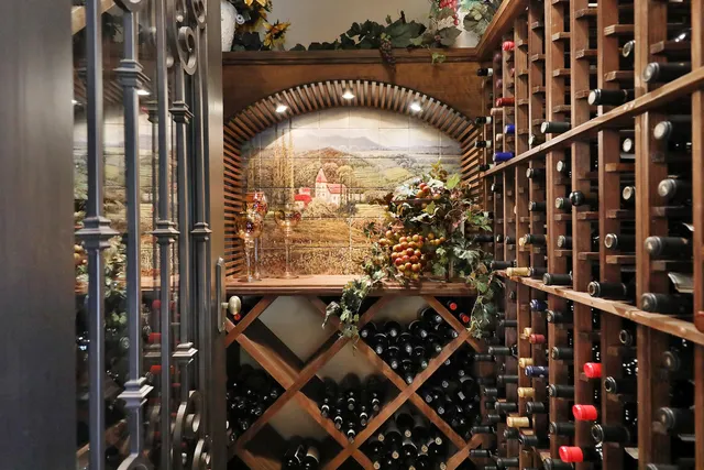 a view of a livingroom with furniture and a ceiling fan