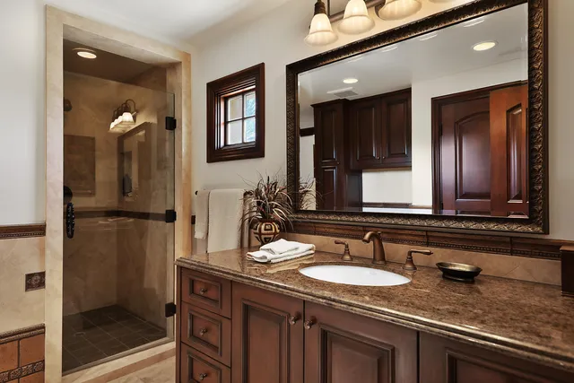 a building outdoor space with patio furniture and a potted plant