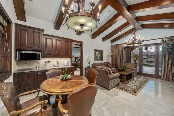 a view of a dining room with furniture window and outside view