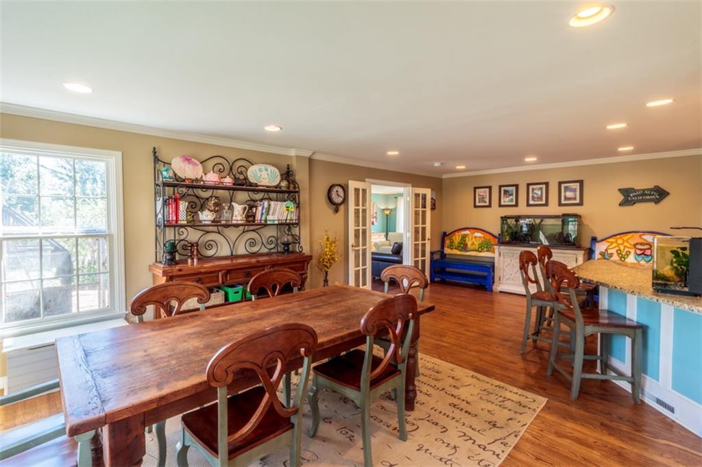 20 Alexander Place Pittsburgh, PA 15243 - Photo 5 of 25 a view of a dining room with furniture window and wooden floor