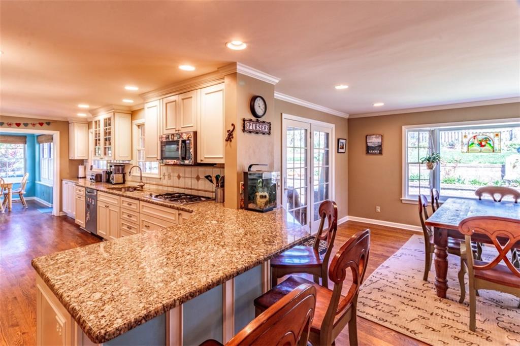 20 Alexander Place Pittsburgh, PA 15243 - Photo 6 of 25 a kitchen with stainless steel appliances granite countertop sink stove and refrigerator