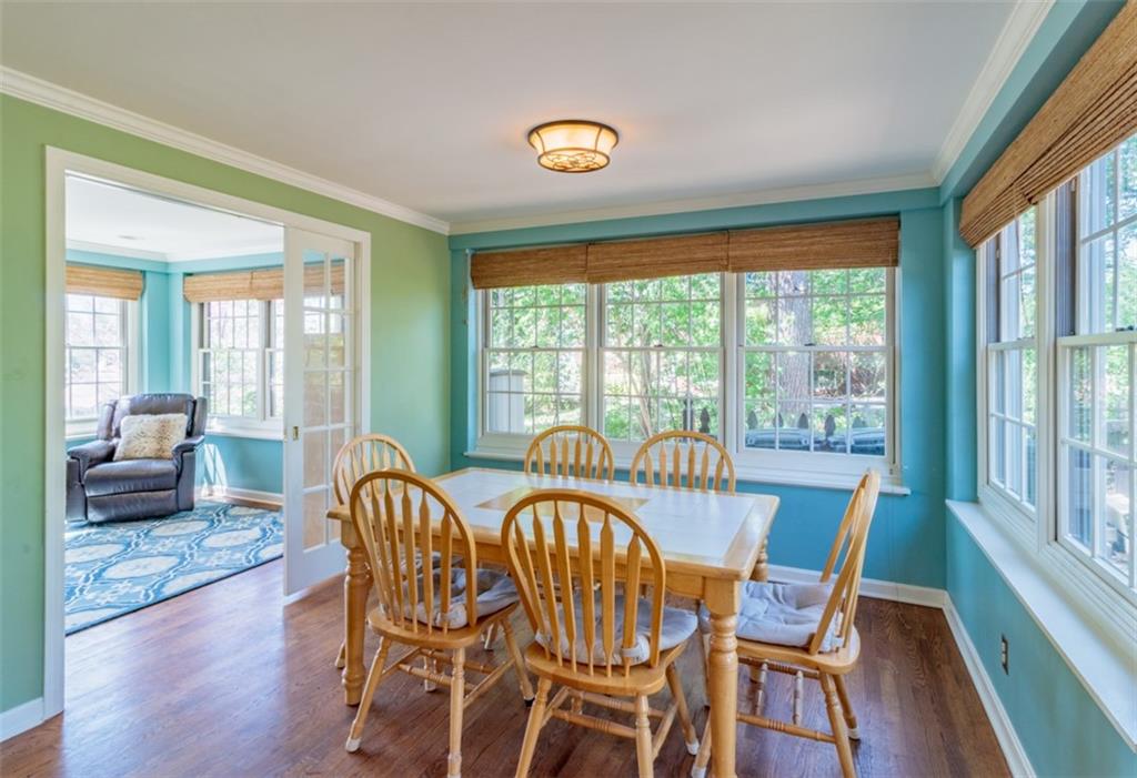 20 Alexander Place Pittsburgh, PA 15243 - Photo 9 of 25 a view of a dining room with furniture window and wooden floor