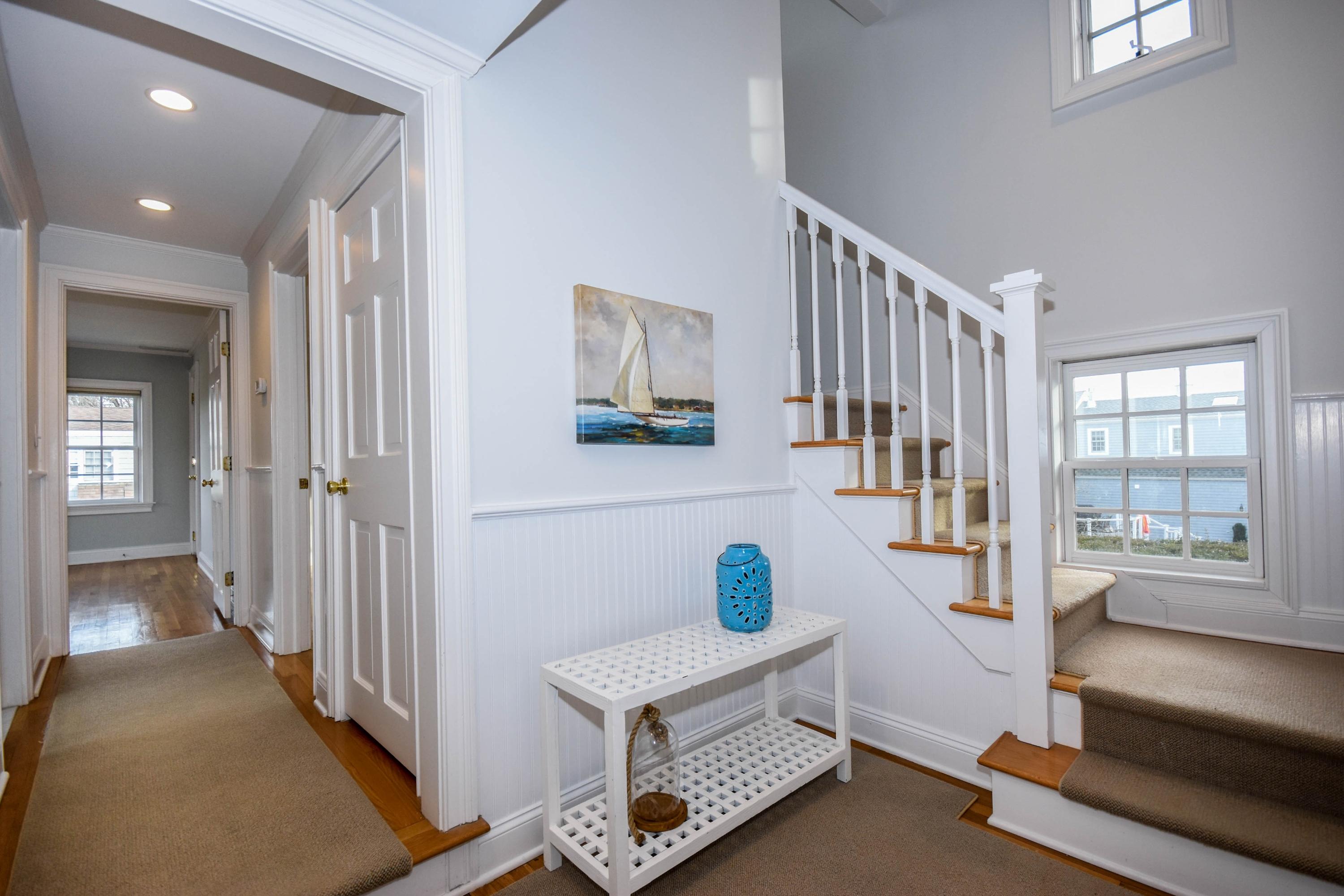 22 Meridian Road Rowayton, CT 06853 - Photo 15 of 25 a hallway with furniture and a window