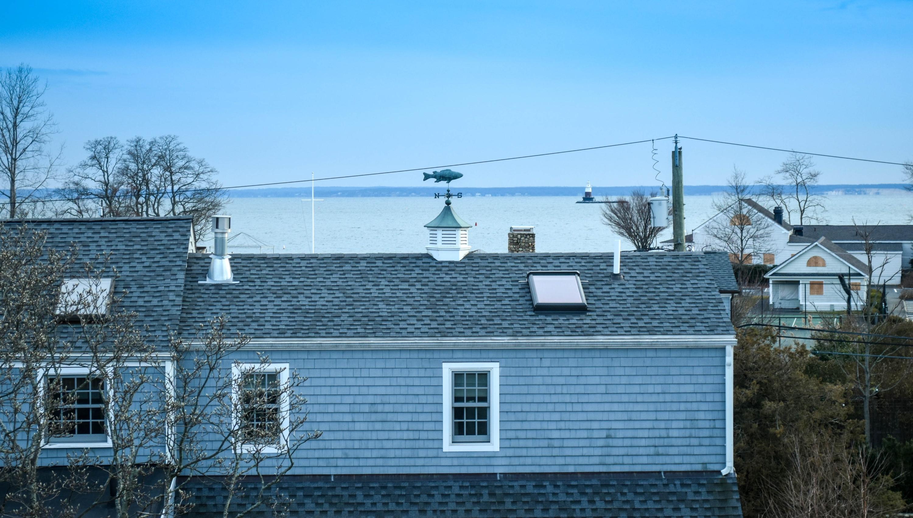 22 Meridian Road Rowayton, CT 06853 - Photo 19 of 25 a view of a brick house with a yard