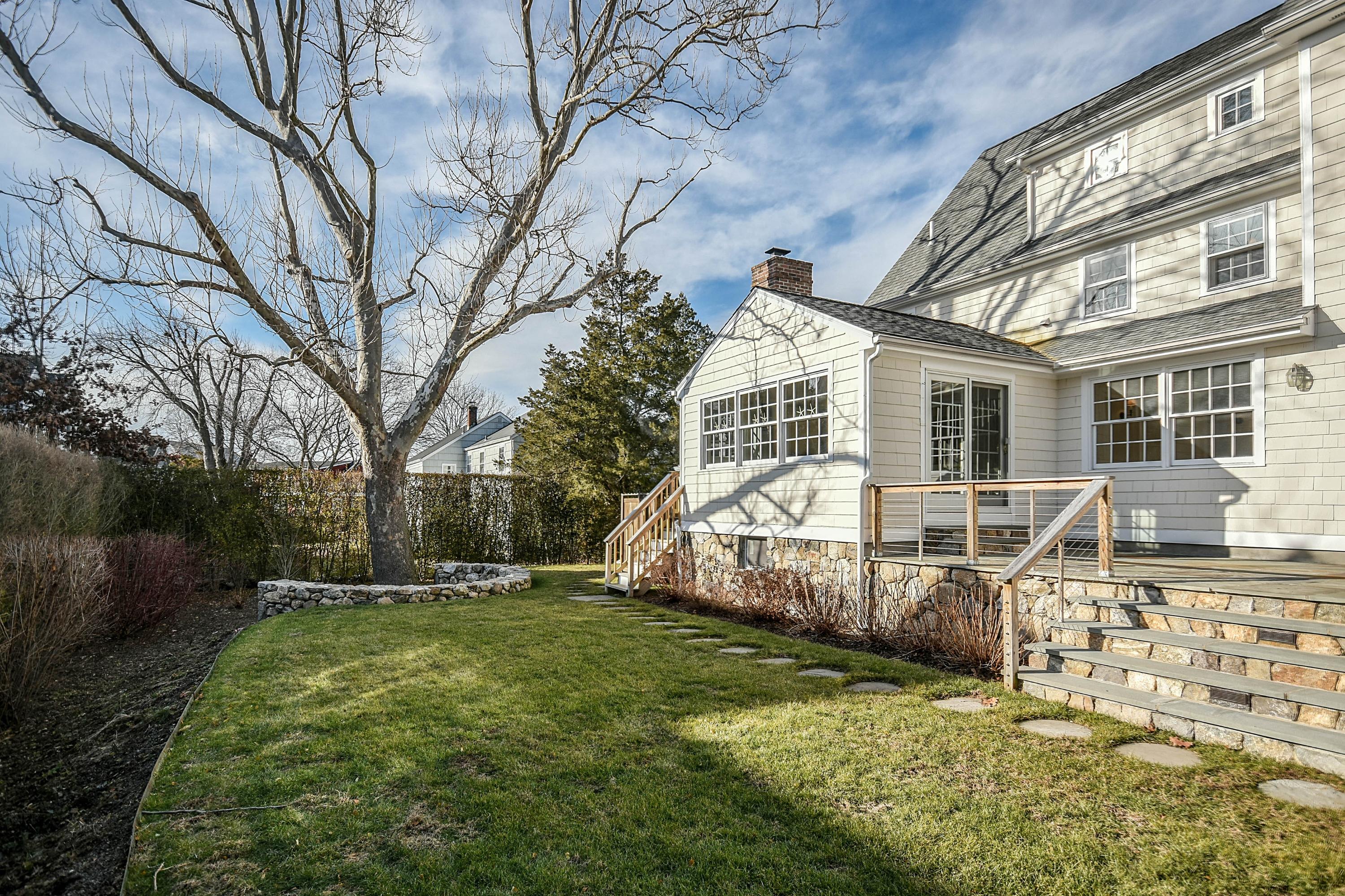 22 Meridian Road Rowayton, CT 06853 - Photo 24 of 25 a view of a house with backyard and sitting area
