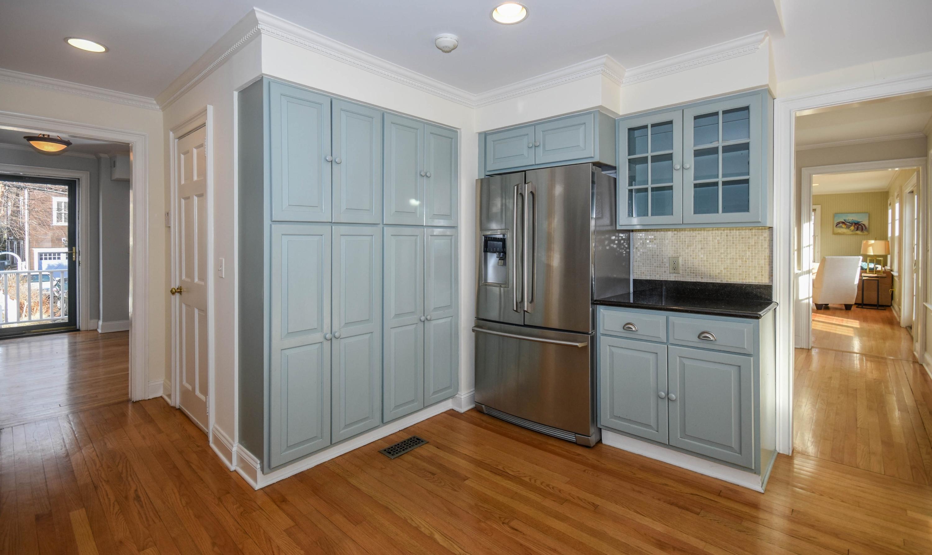 22 Meridian Road Rowayton, CT 06853 - Photo 4 of 25 a kitchen with stainless steel appliances granite countertop a refrigerator and a stove top oven