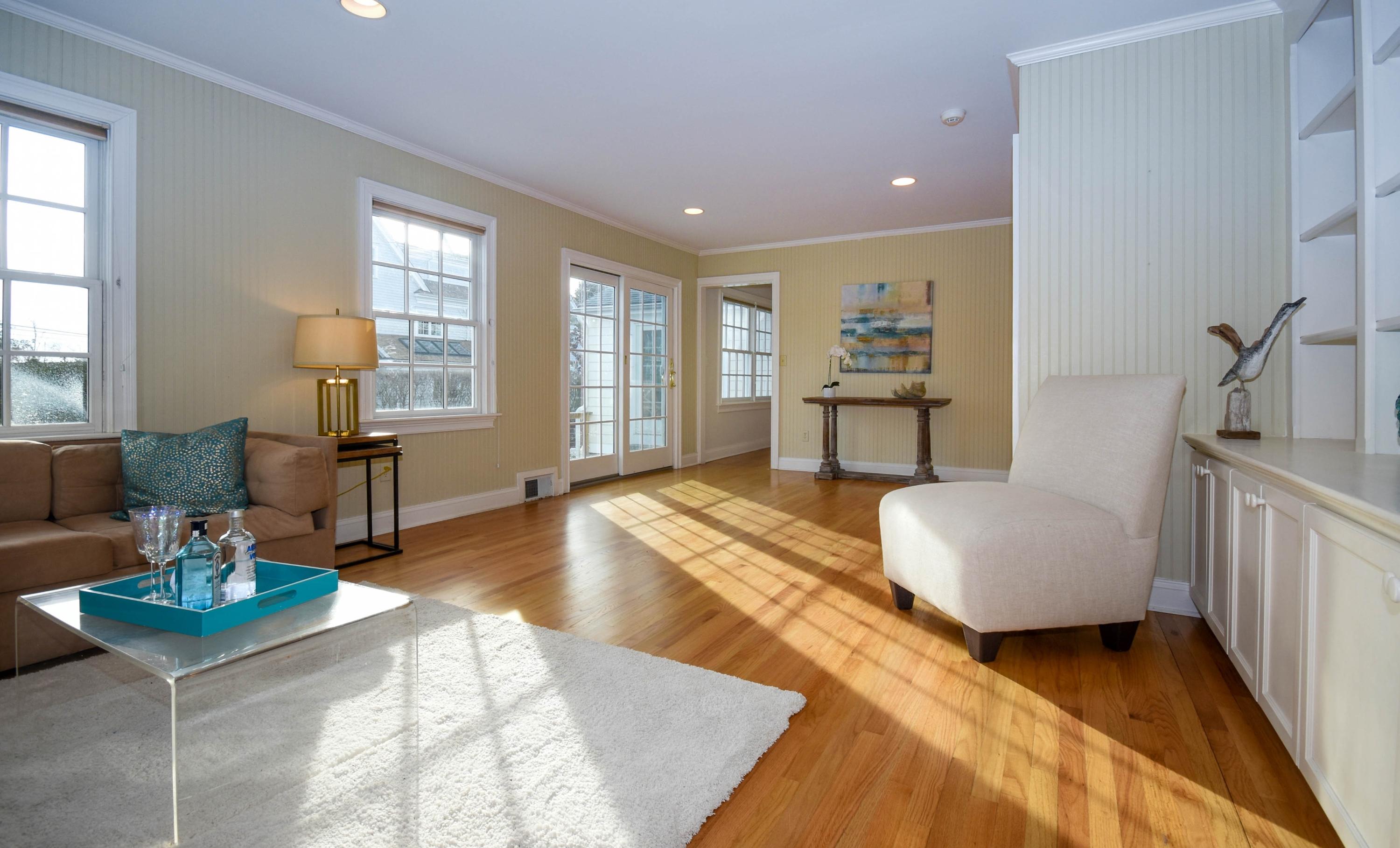 22 Meridian Road Rowayton, CT 06853 - Photo 10 of 25 a living room with furniture and a table
