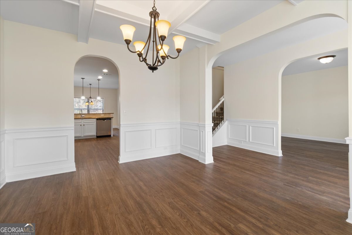 149 Mariahs Walk Hampton, GA 30228 - Photo 11 of 45 wooden floor in an empty room with a window