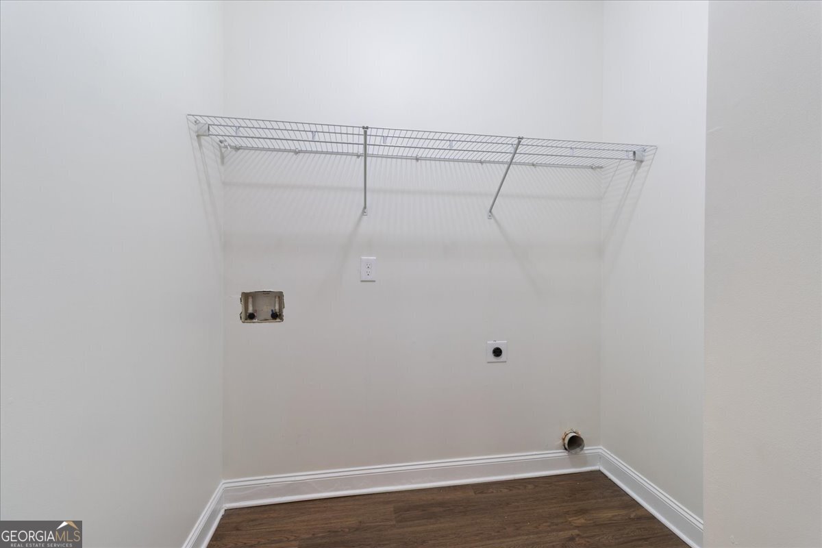 149 Mariahs Walk Hampton, GA 30228 - Photo 23 of 45 a view of a room with racks on the wall