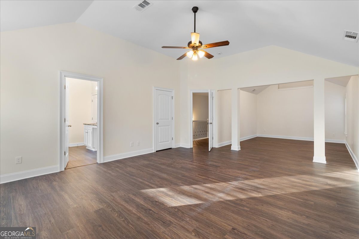 149 Mariahs Walk Hampton, GA 30228 - Photo 29 of 45 a view of an empty room with wooden floor