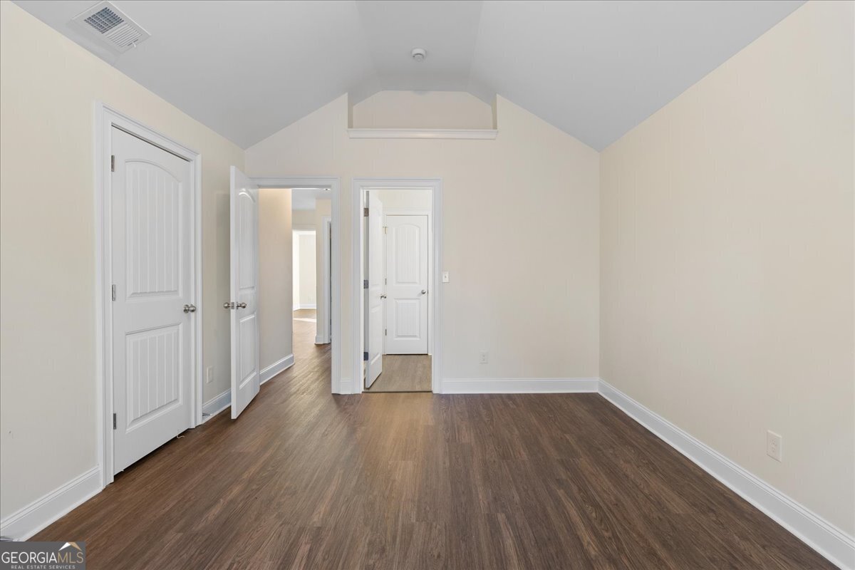 149 Mariahs Walk Hampton, GA 30228 - Photo 38 of 45 a view of a room with wooden floor