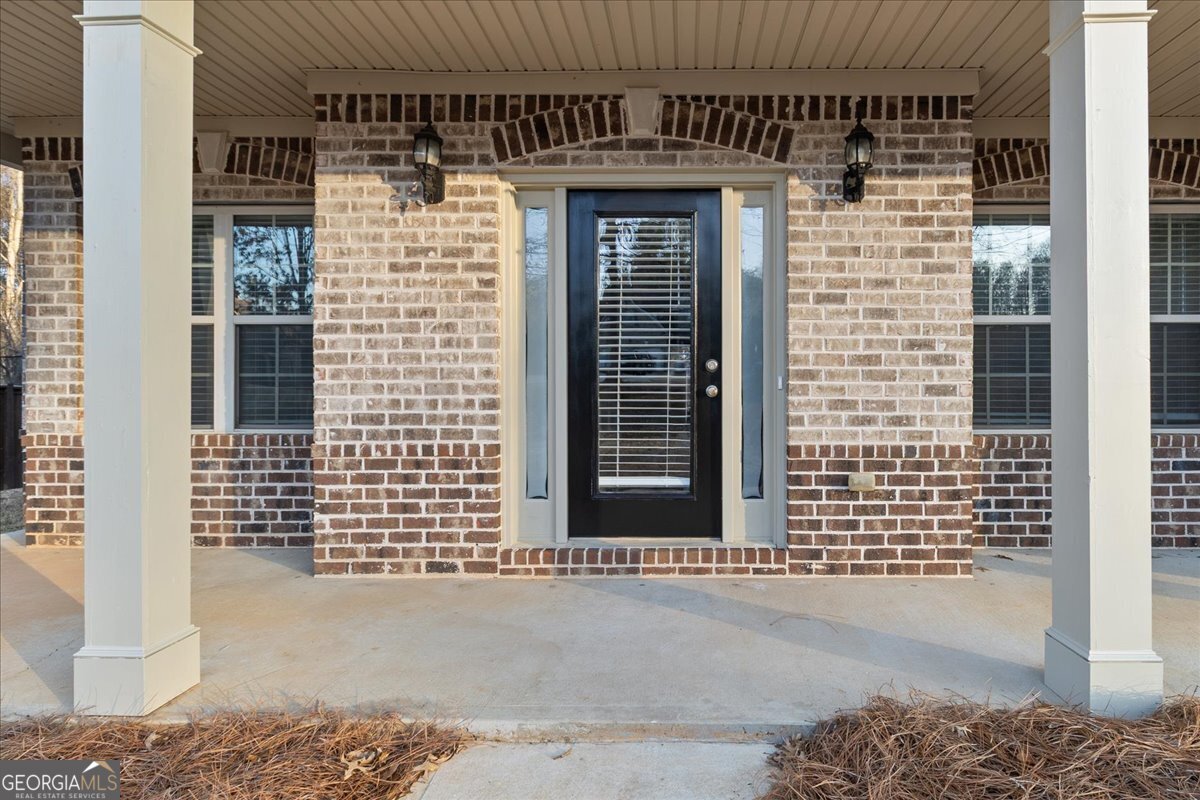 149 Mariahs Walk Hampton, GA 30228 - Photo 5 of 45 a front view of a house