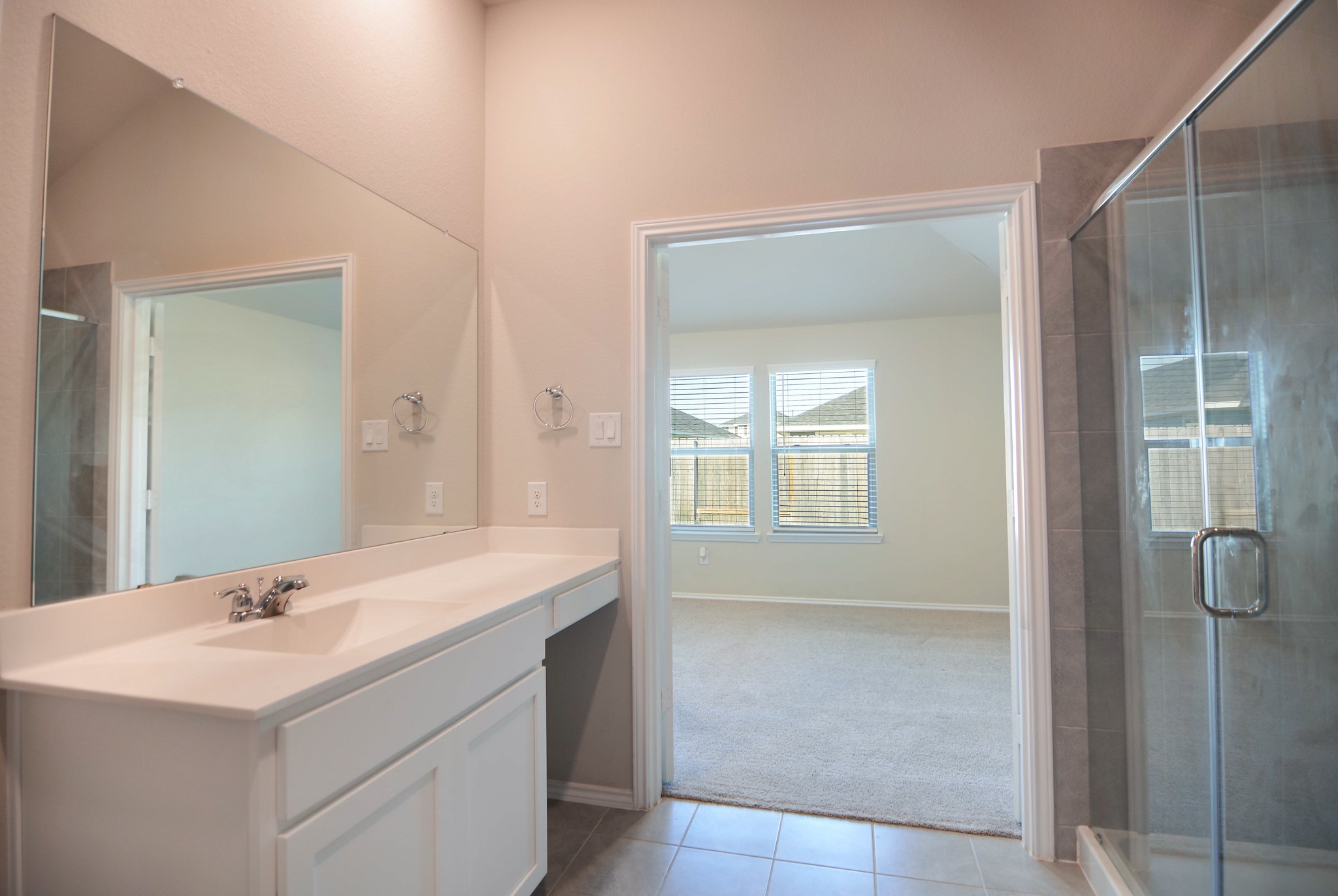 21434 Holly Heights Road Cypress, TX 77433 - Photo 11 of 17 a bathroom with a sink and a mirror