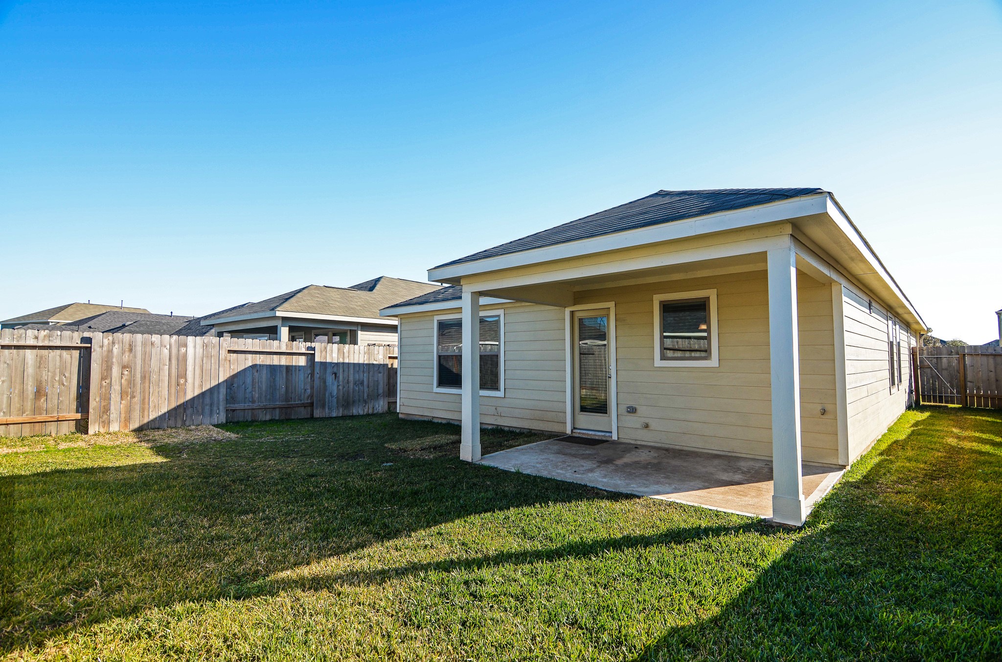 21434 Holly Heights Road Cypress, TX 77433 - Photo 17 of 17 a view of backyard with a garden and deck