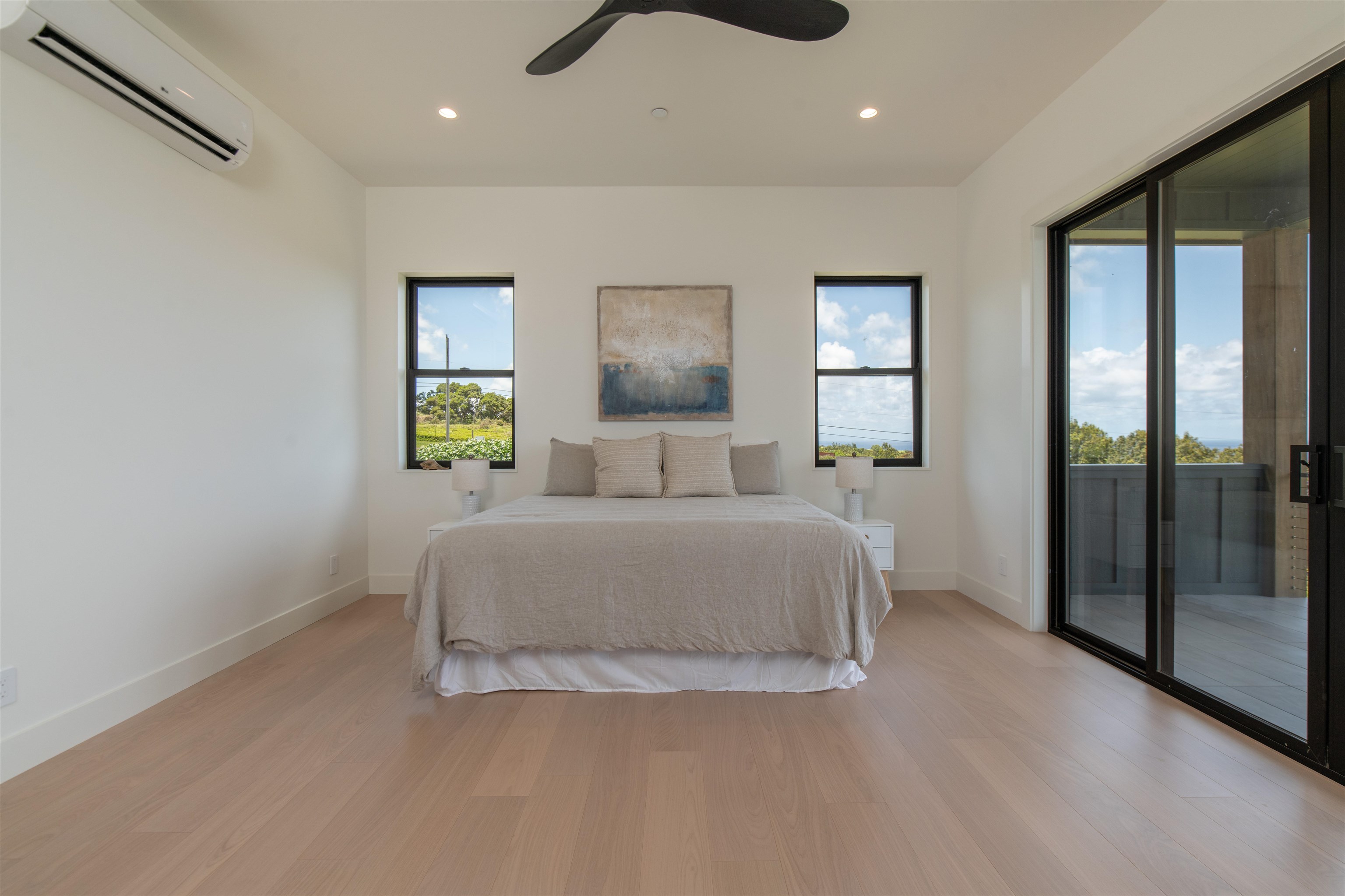 111 Mehana Road, Unit A Haiku, HI 96708 - Photo 44 of 50 a bedroom with a bed and window