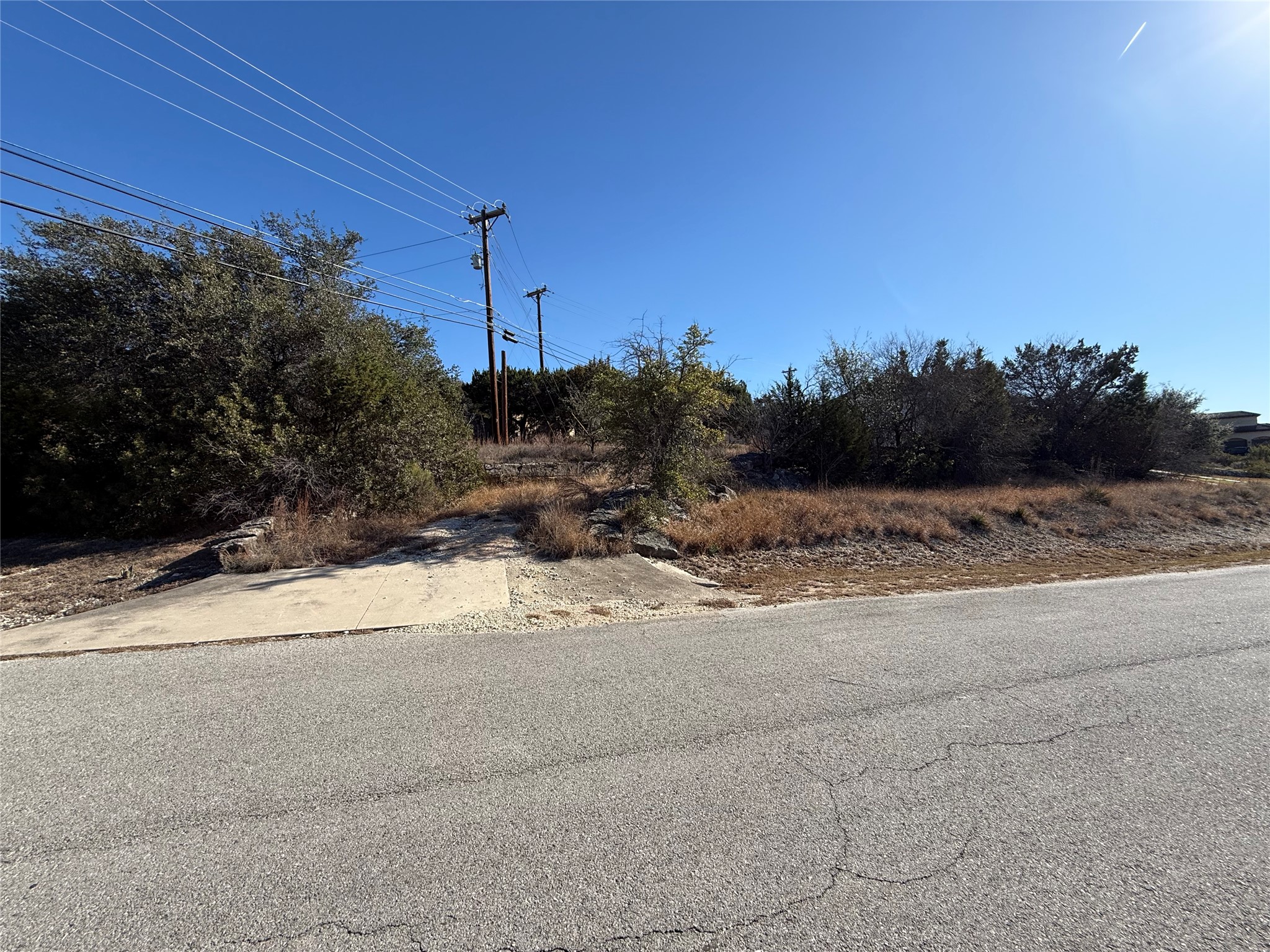 14410 Geronimo Street Leander, TX 78641 - Photo 3 of 14 a view of a road with a mountain view