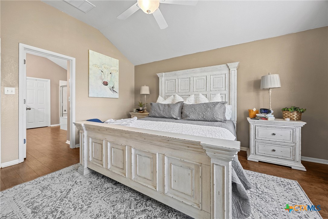 350 Lehne Road Bertram, TX 78605 - Photo 22 of 33 a bedroom with a bed and a dresser