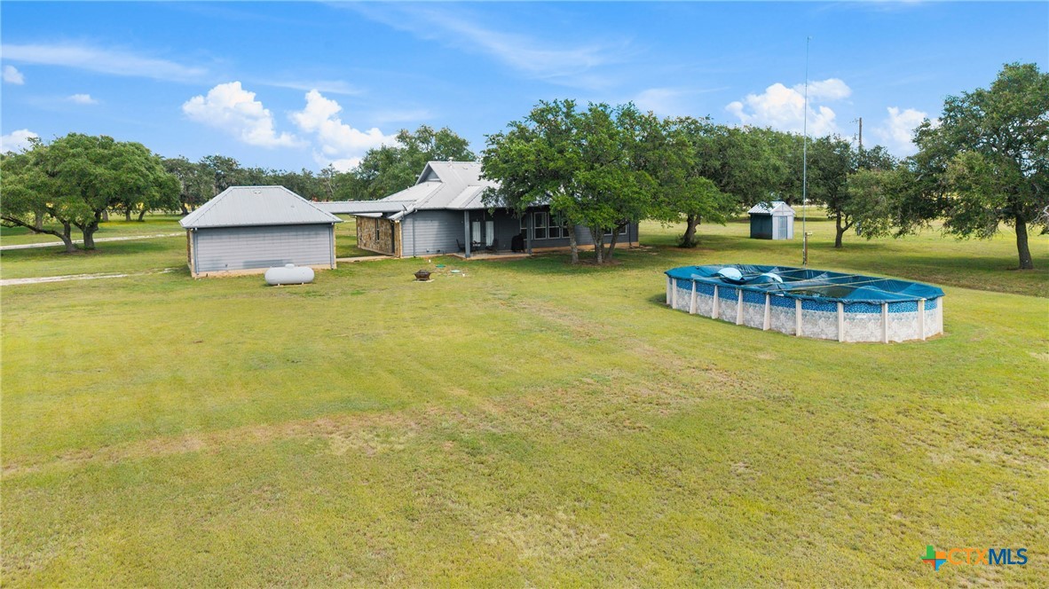 350 Lehne Road Bertram, TX 78605 - Photo 30 of 33 a house view with a garden space