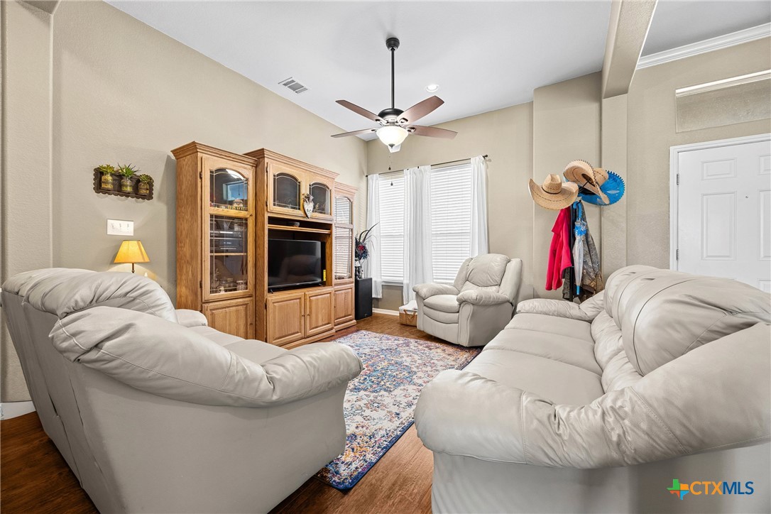 350 Lehne Road Bertram, TX 78605 - Photo 7 of 33 a living room with furniture and a flat screen tv