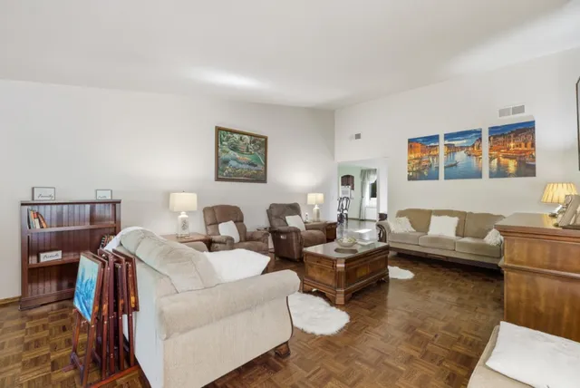 a living room with furniture and a couch