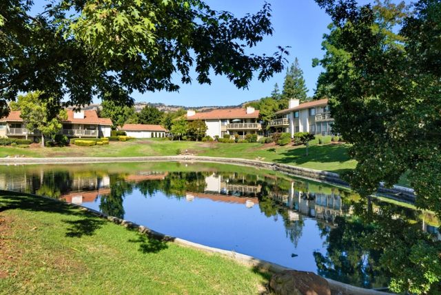 a view of a lake with houses