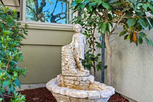 a vase of flowers sitting on a table