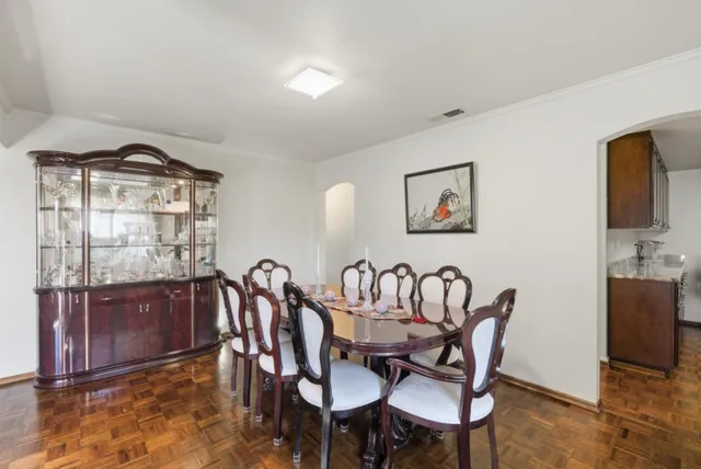 a view of a dining room with furniture