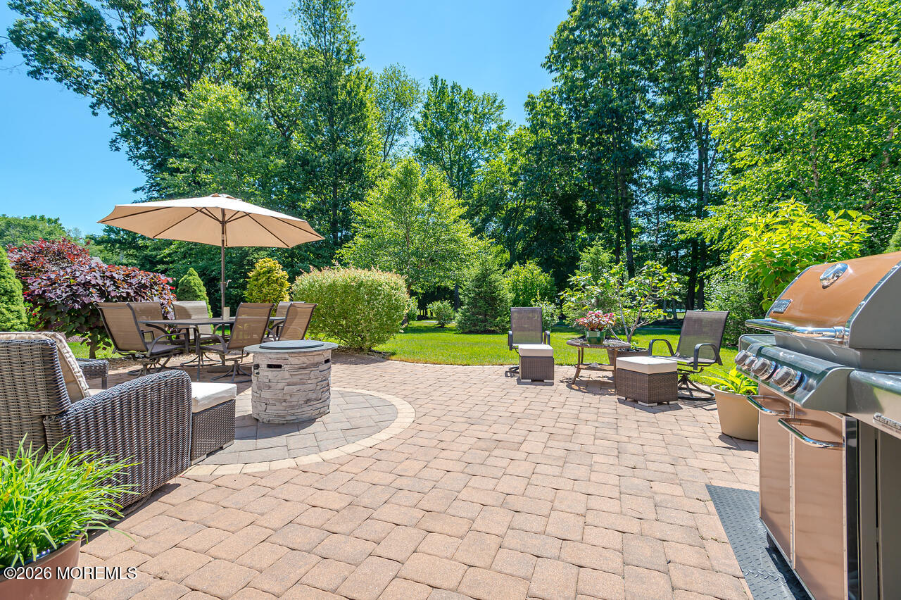 5 Tree Line Drive Freehold, NJ 07728 - Photo 30 of 57 Tree line patio w umbrella