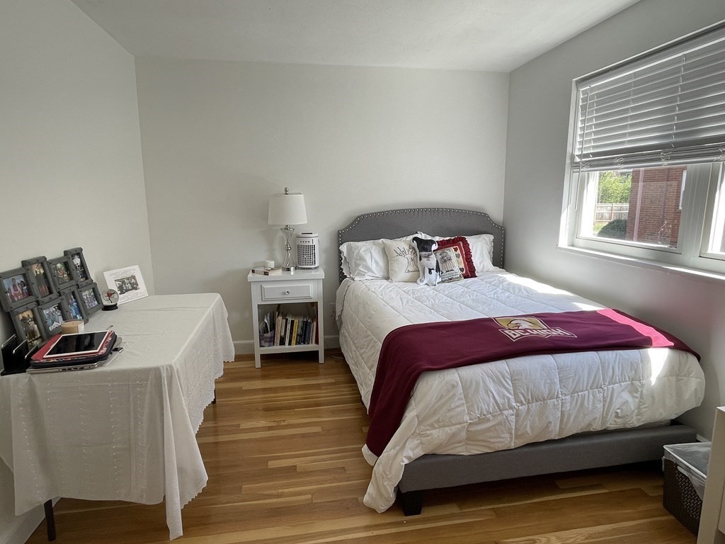 32 Whitman Road, Unit 12 Waltham, MA 02453 - Photo 16 of 19 a bedroom with bed and window